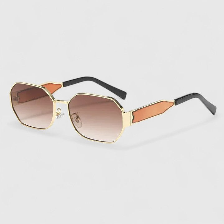 Gafas de sol elegantes Jaylynne de Warszawska Elegancja con montura en tonos neutros y lentes oscuras.