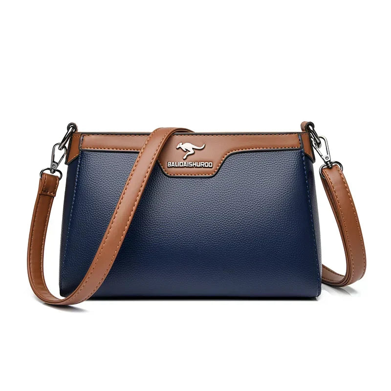 Bolso cruzado Olga de Warszawska Elegancja, tote simple y elegante en color neutro, vista frontal con correa ajustable