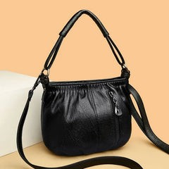 Bolso multicapas Katarzyna de Warszawska Elegancja, diseño contemporáneo y elegante, con múltiples compartimentos y detalles modernos.