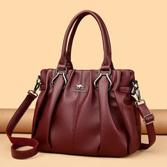 Bolsa cruzada marca Warszawska Elegancja, estilo cotidiano, en color negro, con correa ajustable y diseño elegante.