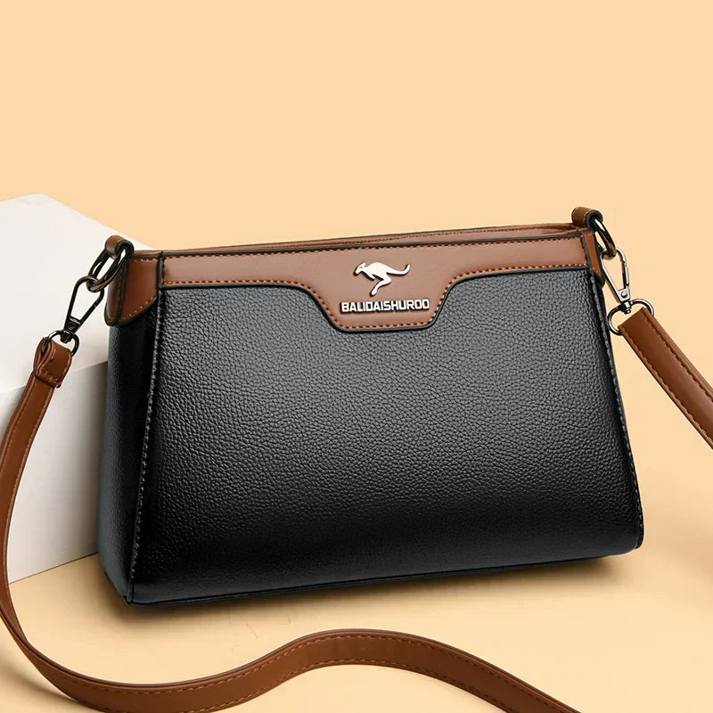 Bolso bandolera Olga de Warszawska Elegancja, bolso cruzado de un solo lado en color neutro con detalles elegantes.