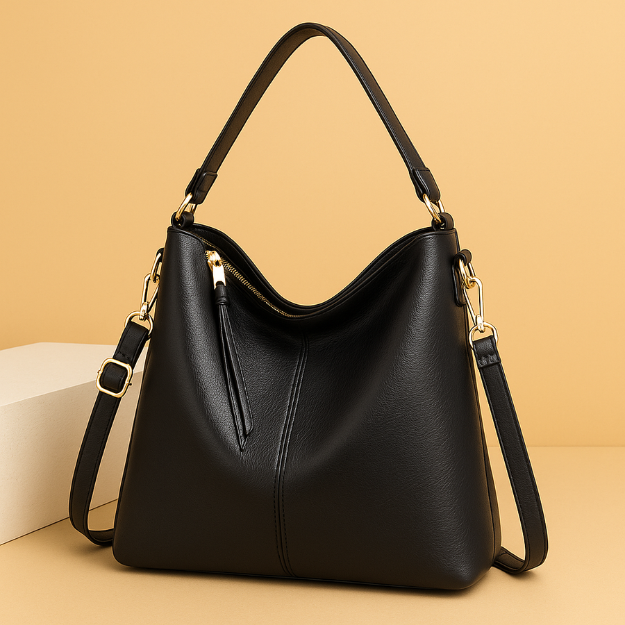 Bolsa hobo de cuero Justyna de Warszawska Elegancja, con diseño elegante y asas largas, en color marrón.
