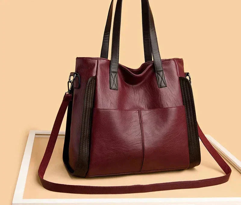 Bolsa de cuero azul Weronika Indigo Classic de Warszawska Elegancja, con diseño clásico y detalles elegantes.