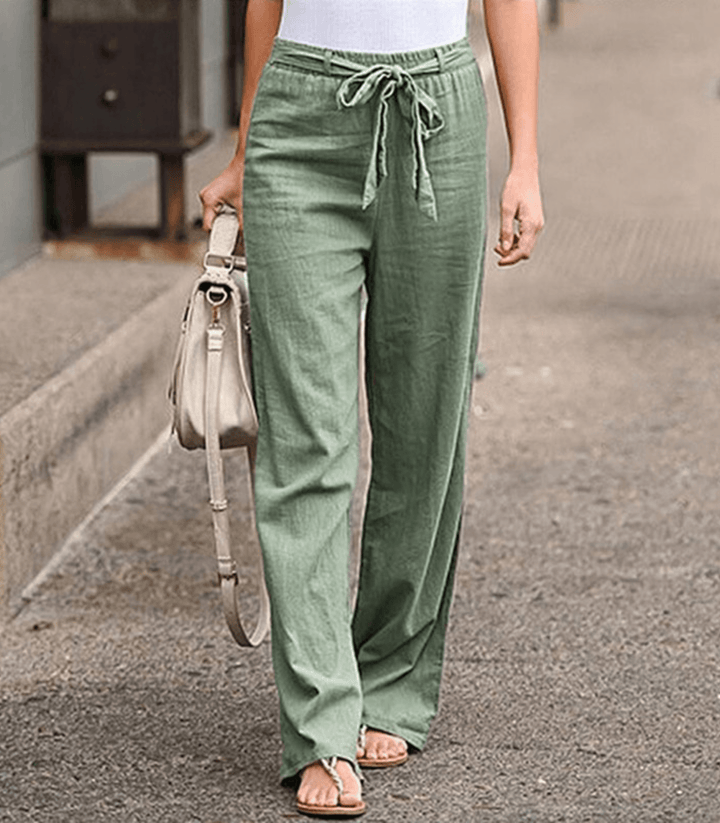 Pantalones relajados de algodón y lino para mujer con cordón y cinturilla elástica, en color neutro, de la marca Warszawska Elegancja.