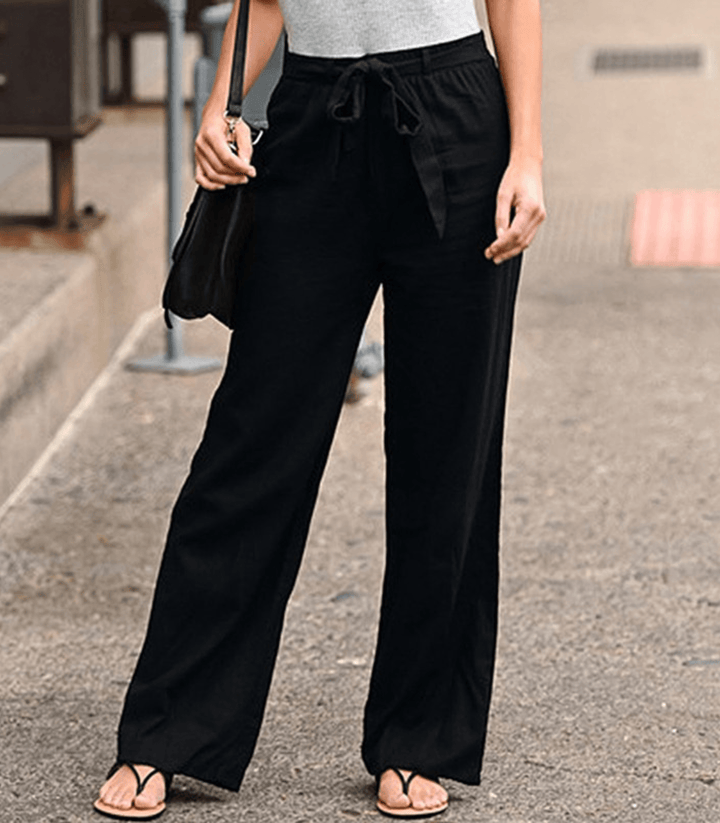 Pantalones relajados de algodón y lino para mujer con cordón y cinturilla elástica, de la marca Warszawska Elegancja.