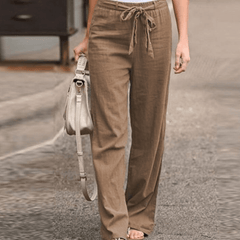 Pantalones relajados de algodón y lino para mujer con cordón ajustable y cinturilla elástica, de la marca Warszawska Elegancja.