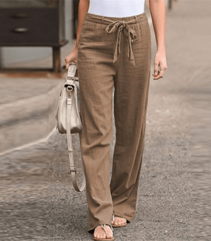 Pantalones relajados de algodón y lino para mujer con cordón ajustable y cinturilla elástica, de la marca Warszawska Elegancja.