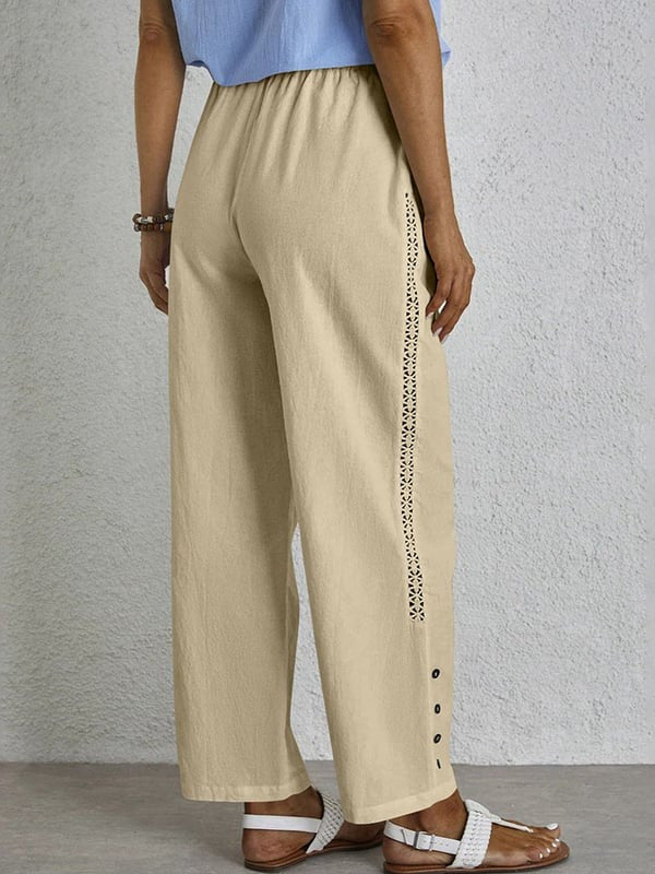 Pantalones relajados Shania de Warszawska Elegancja con botones, estilo casual y cómodo, en color neutro.