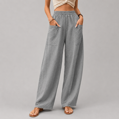 Pantalones sueltos Vanna de Warszawska Elegancja en color neutro, con cintura elástica y diseño cómodo para mujer.