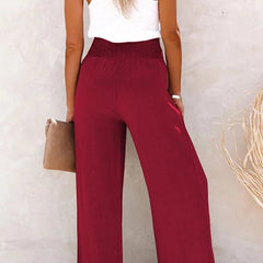 Pantalones relax de cintura alta Riana de Warszawska Elegancja, pantalones cómodos y elegantes para uso diario.
