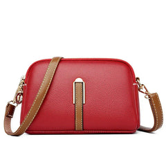Bolso de mujer Nina de piel azul, diseñado por Warszawska Elegancja, con estilo elegante y detalles sofisticados.