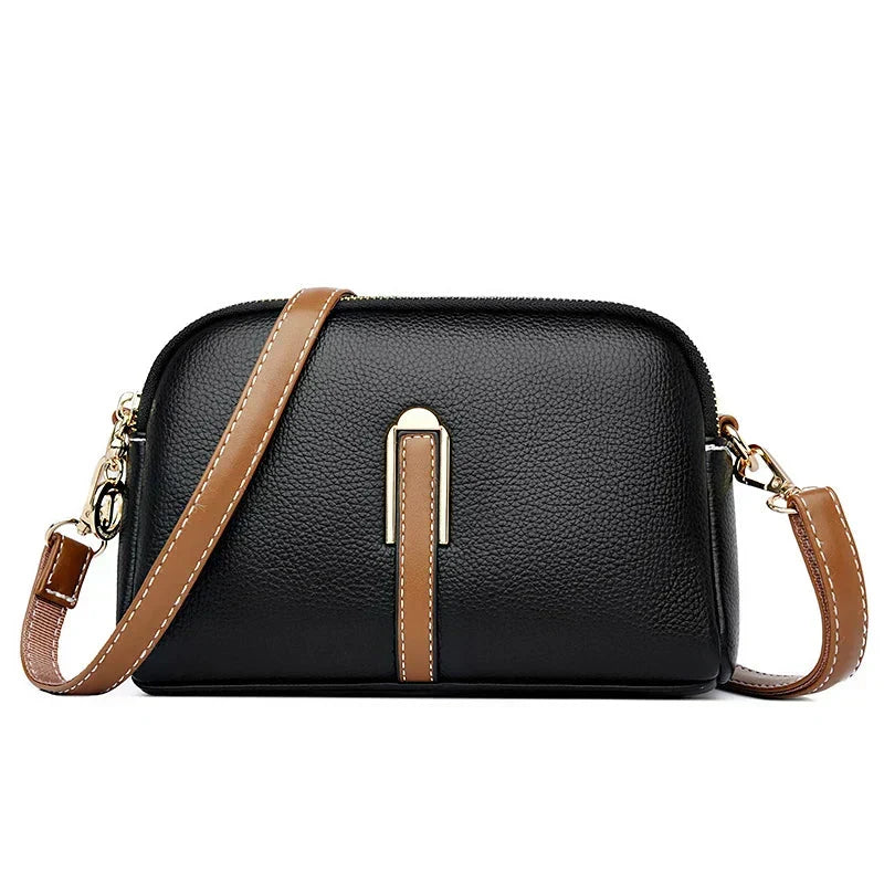 Bolso de mujer Nina de piel azul de Warszawska Elegancja, con diseño elegante y detalles en cuero auténtico.