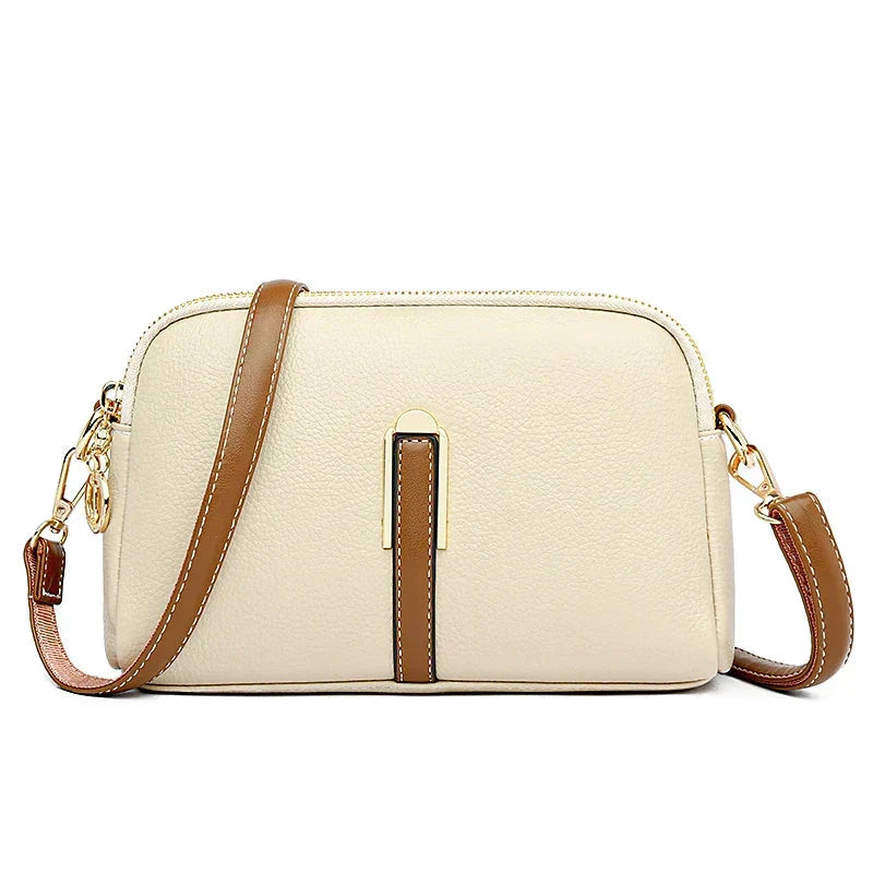 Bolsa de cuero Nina de Warszawska Elegancja en color azul, con diseño elegante y detalles en piel para mujer.
