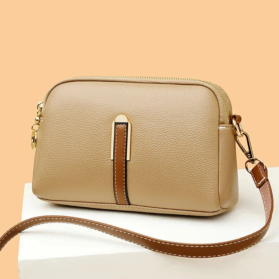 Bolso de piel Nina de Warszawska Elegancja, bolso de mujer azul con diseño elegante y acabado de alta calidad.