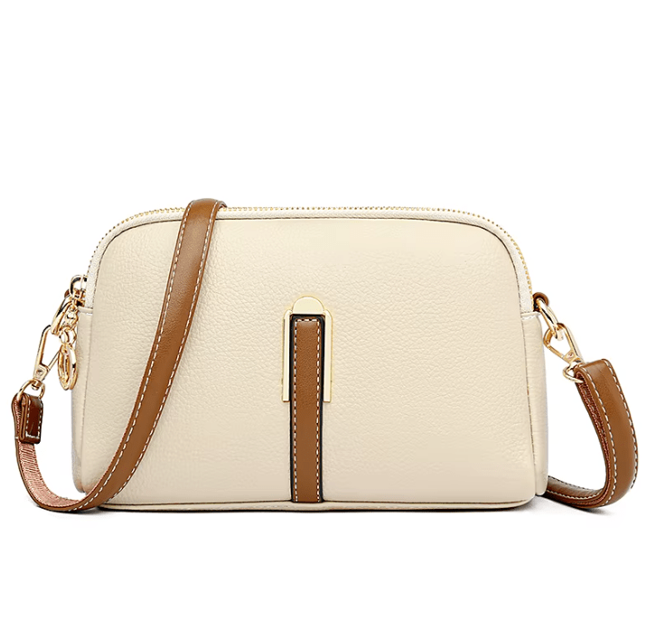 Bolso de mujer Nina de piel en color azul, de la marca Warszawska Elegancja, con diseño elegante y práctico.