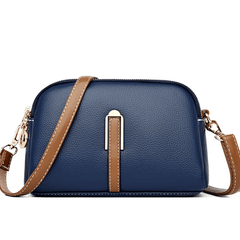 Bolso de mujer Nina de piel de la marca Warszawska Elegancja en color azul con detalles elegantes y asa robusta.