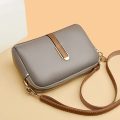 Bolso de mujer Nina de piel azul de Warszawska Elegancja, bolso de mano elegante con detalles en cuero natural.