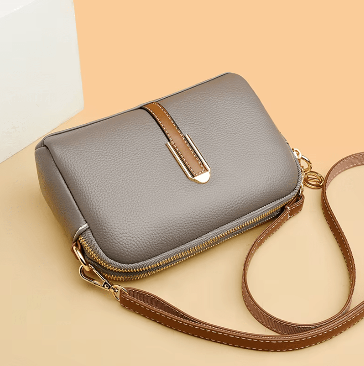 Bolso de mujer Nina de piel azul de Warszawska Elegancja, bolso de mano elegante con detalles en cuero natural.