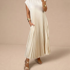 Vestido Aleksandra de Warszawska Elegancja, cómodo y elegante, mostrando su diseño clásico y tejido en la imagen.