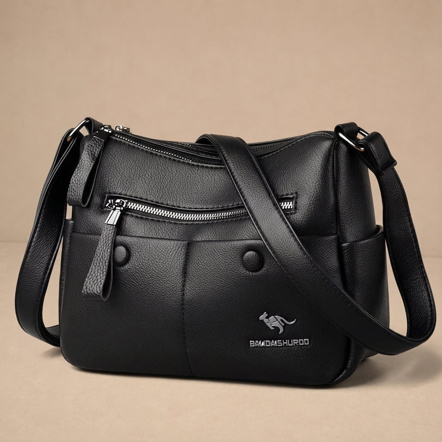 Bolsa de piel natural Agnieszka de Warszawska Elegancja, con diseño elegante y detalles en cuero en la imagen.