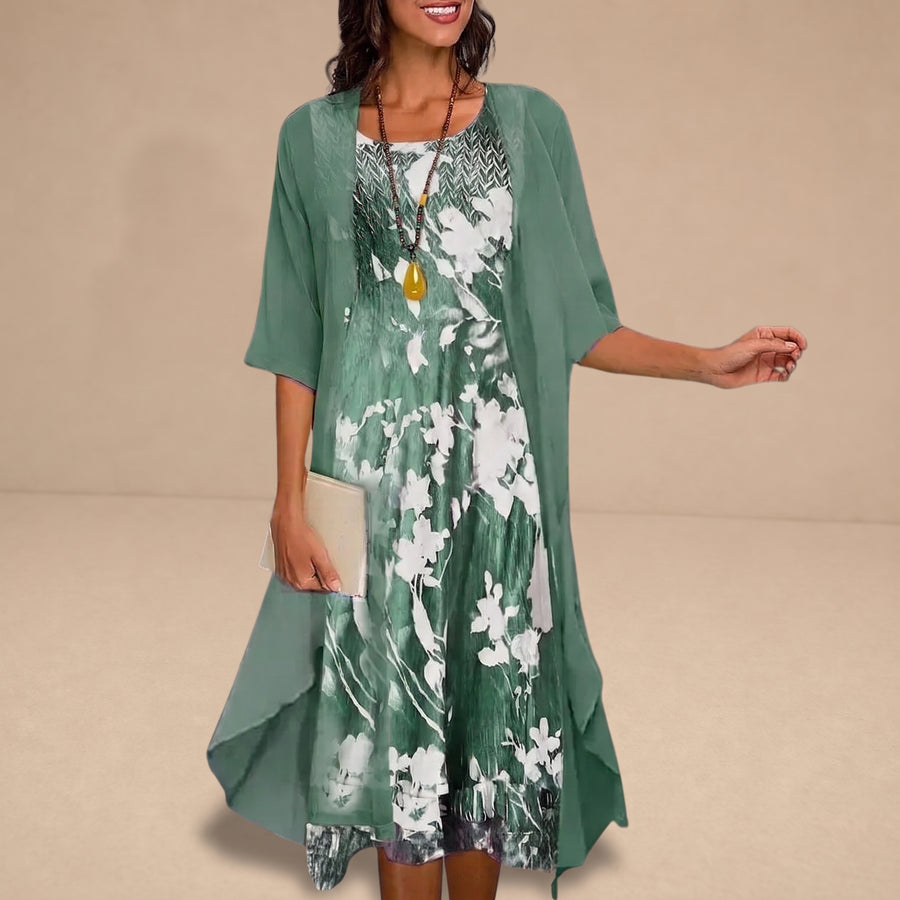 Vestido floral elegante Karolína de Warszawska Elegancja, con diseño sofisticado y detalles florales en tela de alta calidad.