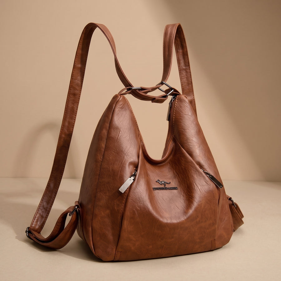 Bolso Karolina Warszawska Elegancja de tamaño mediano, en color neutro, con asas y detalles elegantes para uso diario.