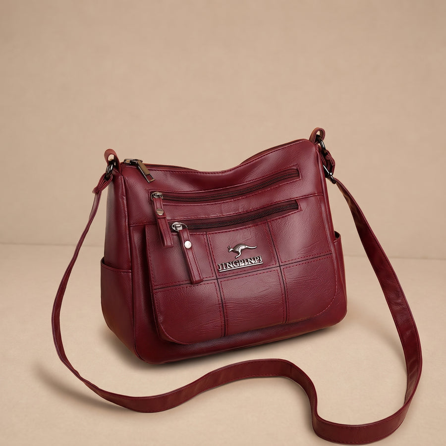 Bolso de mano clásico Maria de Warszawska Elegancja, con diseño elegante y detalles en cuero negro.
