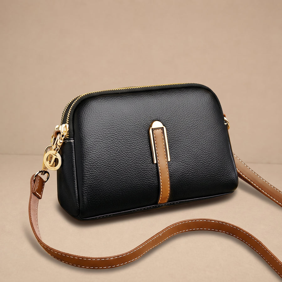 Bolsa de cuero Nina de Warszawska Elegancja, elegante y resistente, con detalles en cuero y diseño clásico para uso diario.
