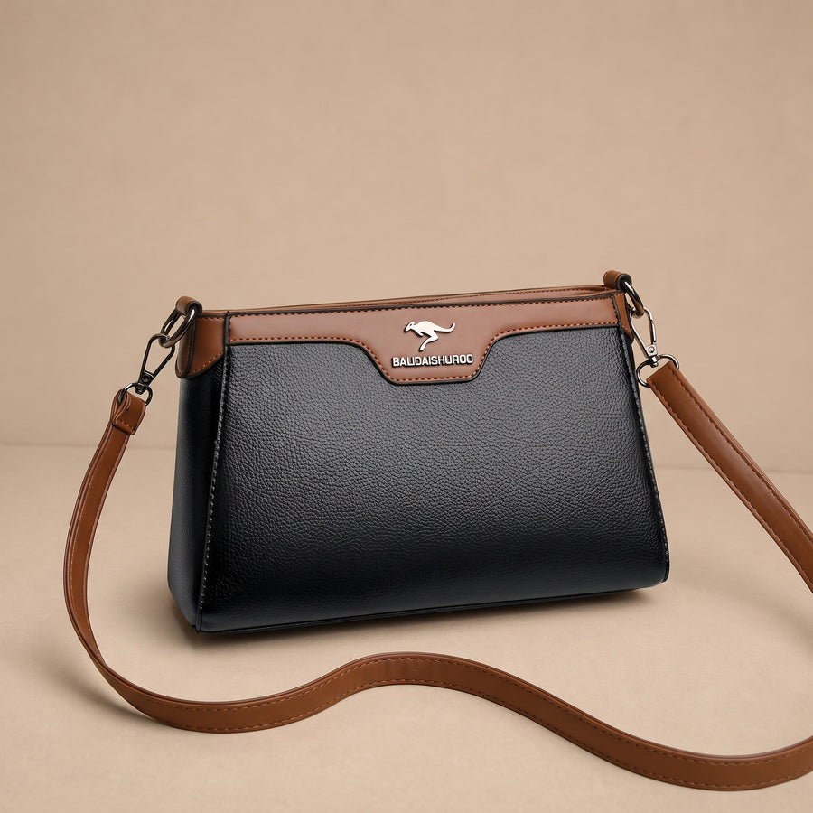 Bolsa cruzada Olga de Warszawska Elegancja en color negro, con diseño sencillo y elegante para uso diario.