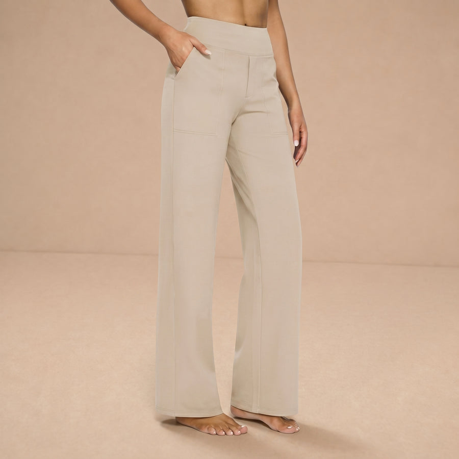 Pantalones sofisticados Hilary de Warszawska Elegancja en color neutro, con diseño elegante y corte ajustado, vista frontal.