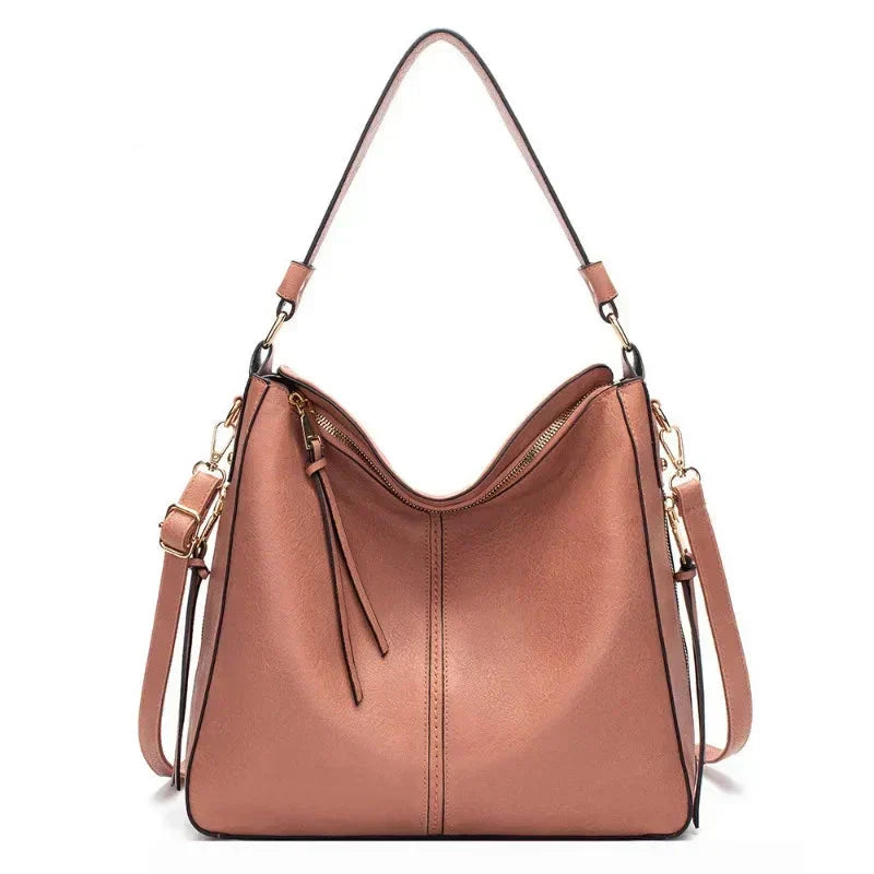 Bolsa hobo de cuero azul para mujer de Warszawska Elegancja, estilo elegante y práctico, con asas y detalles suaves.