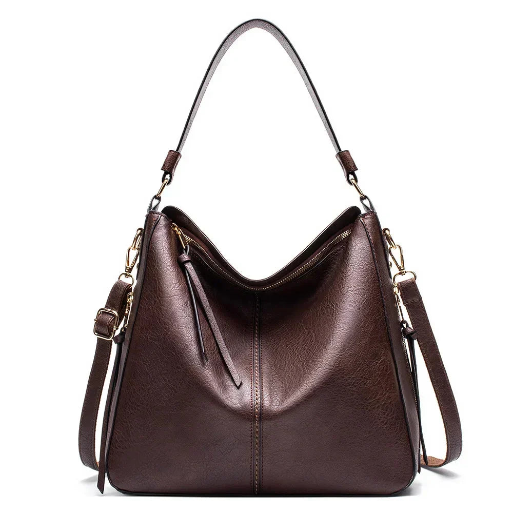 Bolso hobo de cuero azul de la marca Warszawska Elegancja, elegante y espacioso para mujer.