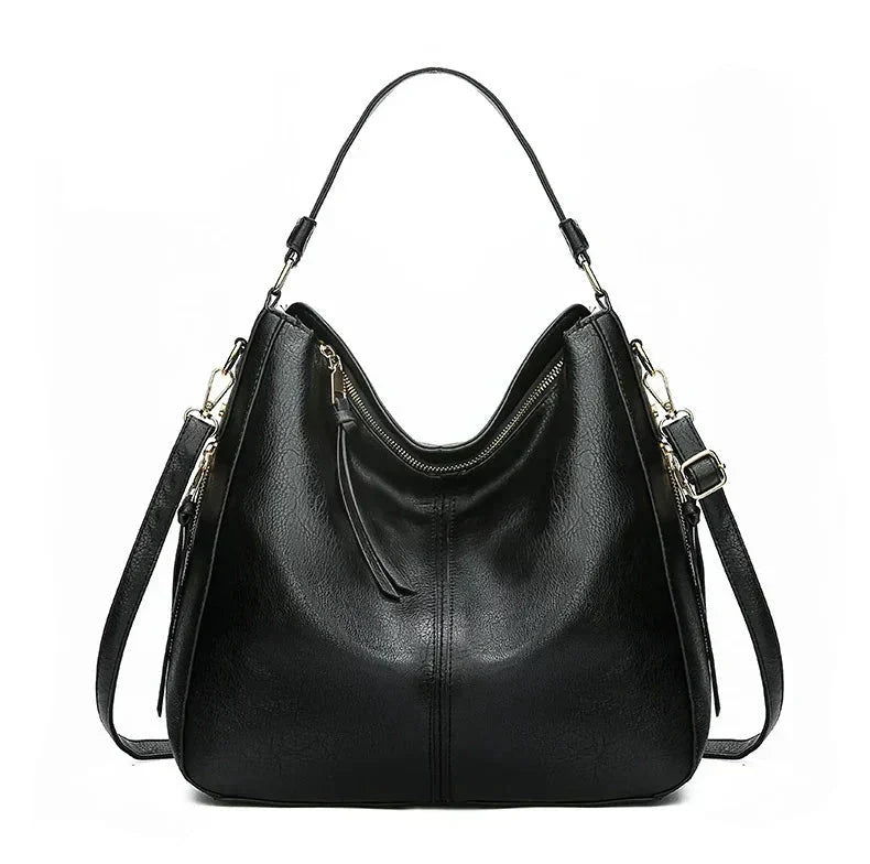 Bolso hobo de cuero para mujer Justyna de Warszawska Elegancja, en color azul, con asa larga y diseño elegante.