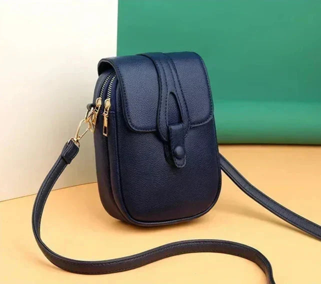 Bolso de cuero retro Sylwia de Warszawska Elegancja, en color azul, con diseño vintage y estilo clásico para mujer.