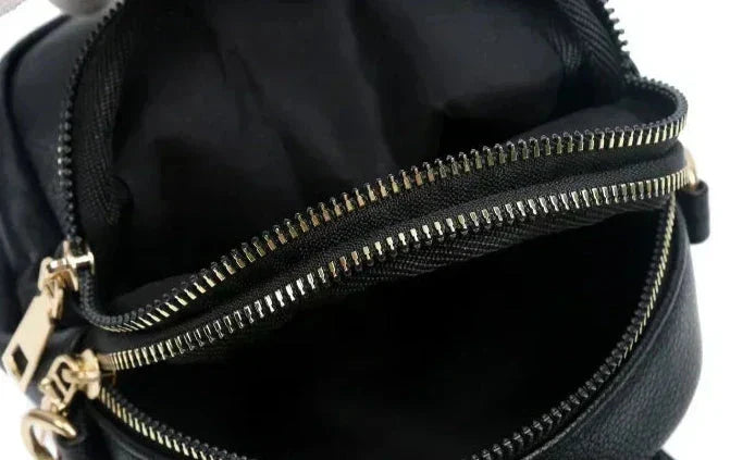 Bolsa de cuero retro Sylwia de Warszawska Elegancja, estilo vintage, en color azul con detalles clásicos para mujer.