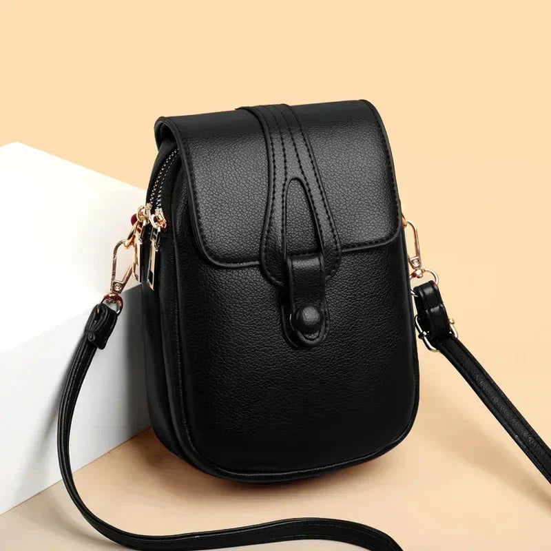 Bolso retro de cuero Sylwia de Warszawska Elegancja, en color azul con diseño clásico y detalles en negro para mujer.