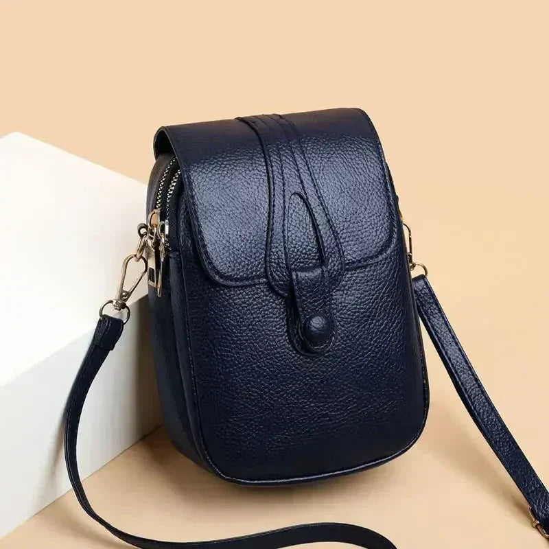 Bolsa de cuero retro Sylwia de Warszawska Elegancja, en color azul con diseño clásico y detalles elegantes para mujer.