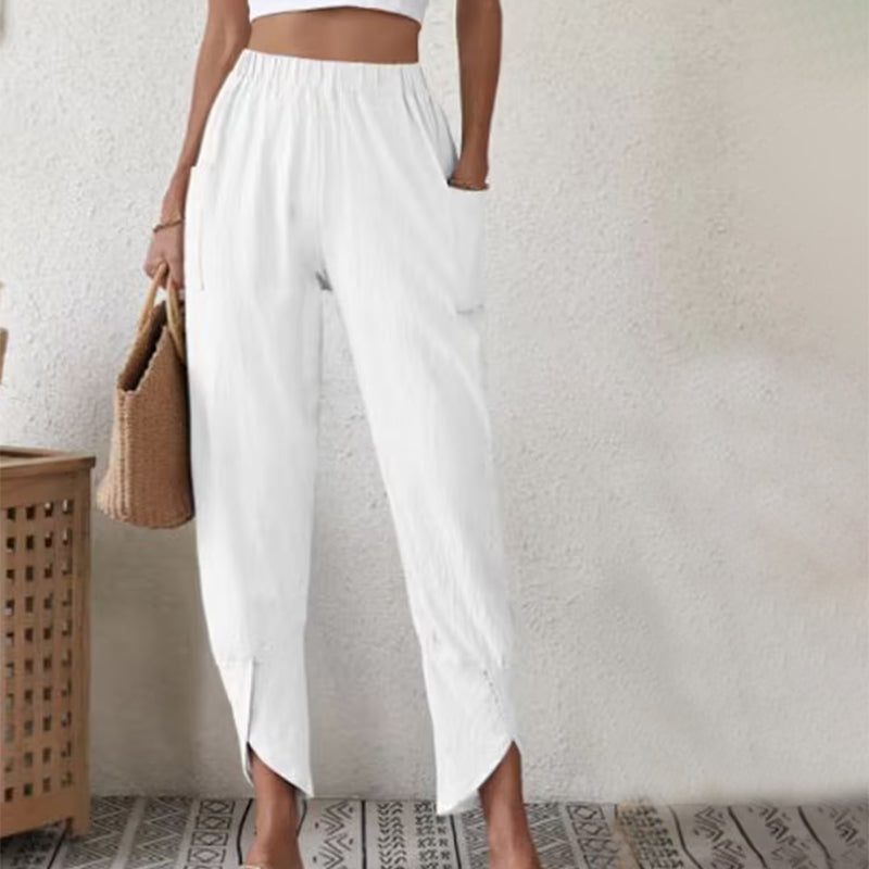 Pantalones de mujer Essari de Warszawska Elegancja con dobladillo crudo y estilo moderno, en color negro.